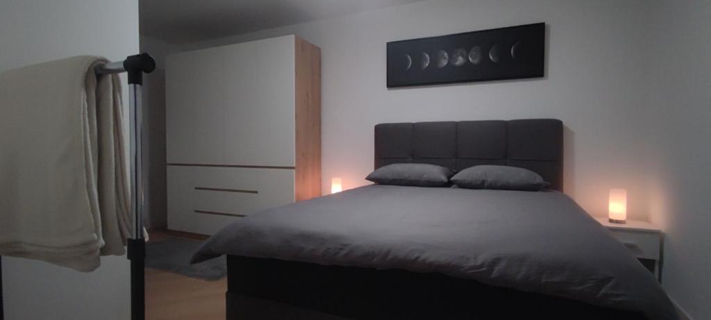 Ένα ή περισσότερα κρεβάτια σε δωμάτιο στο Deniro Apartment