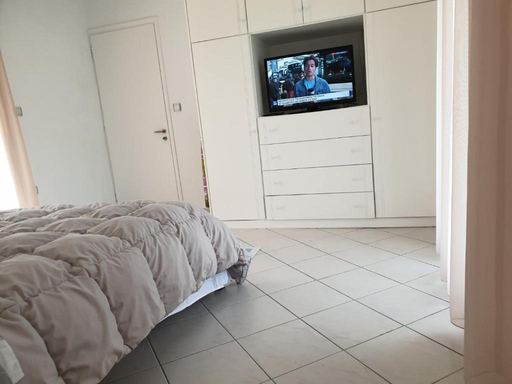 Televízia a/alebo spoločenská miestnosť v ubytovaní Konstantina's House I