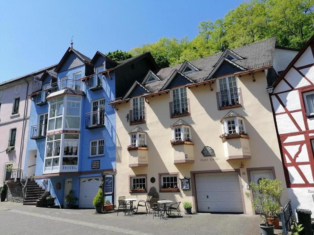 a large white building with a lot of windows at Gästehaus "Ursula" Hotel Garni in Bernkastel-Kues