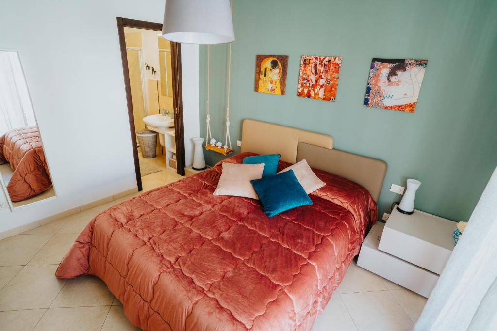 Postel nebo postele na pokoji v ubytování Dimora Donna Matilde