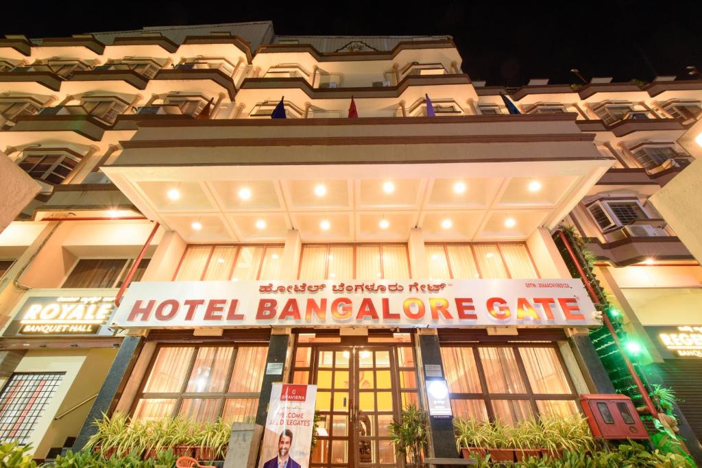 a hotel bangalore gate sign in front of a building at Bangalore Gate Hotel & Conferences in Bangalore