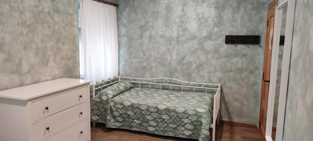 Postel nebo postele na pokoji v ubytování HOSTEL LA CABAÑUELA