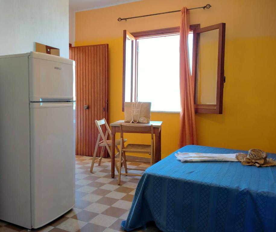 Kuchyňa alebo kuchynka v ubytovaní Testa di Monaco - Basic Beach Accommodations