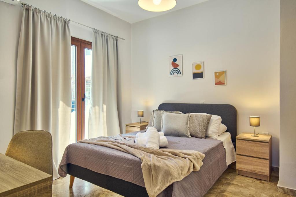 Postel nebo postele na pokoji v ubytování Maria House