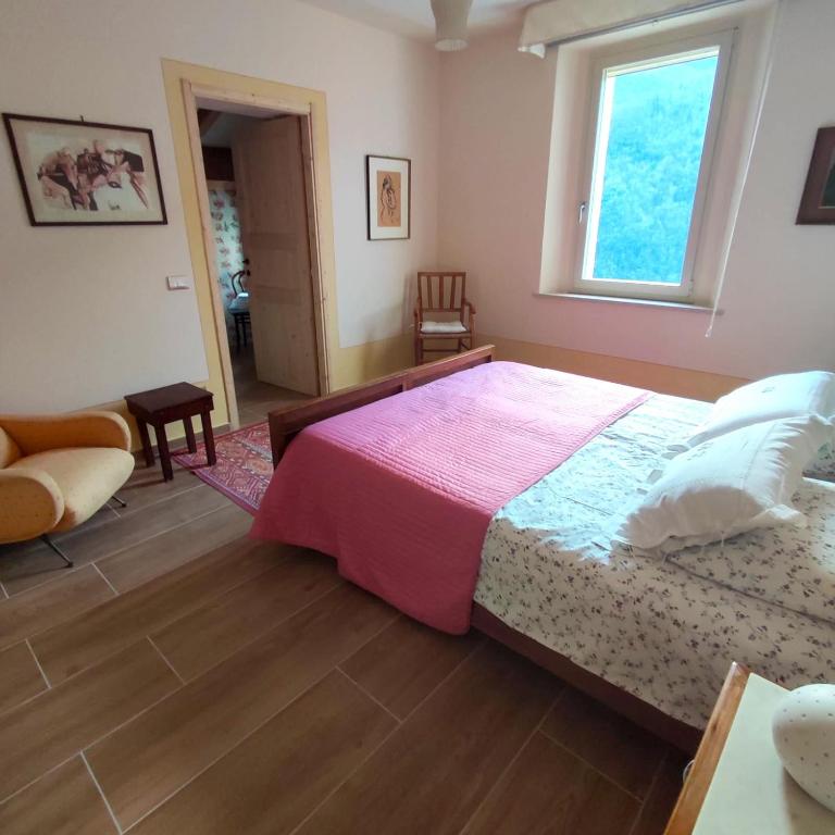 Postel nebo postele na pokoji v ubytování CantoQuinto Bed and Breakfast