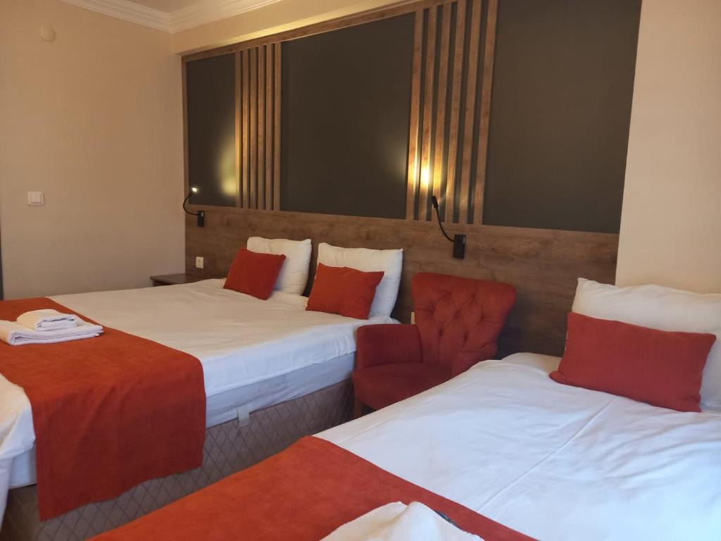 Postel nebo postele na pokoji v ubytování ADOR TROIA HOTEL