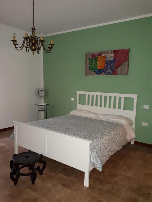 Postel nebo postele na pokoji v ubytování Cà Romi