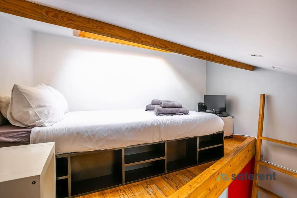 Postel nebo postele na pokoji v ubytování Tiny little home in the city centre
