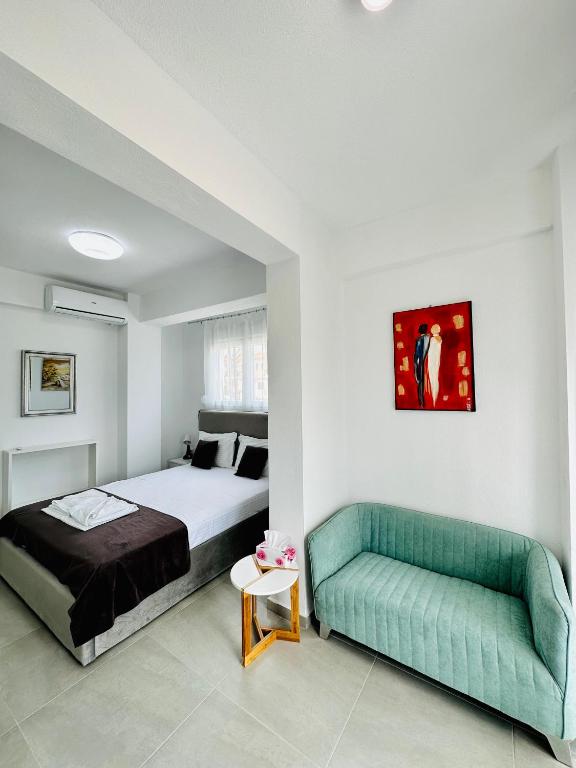 Posteľ alebo postele v izbe v ubytovaní Bella House Nikiti