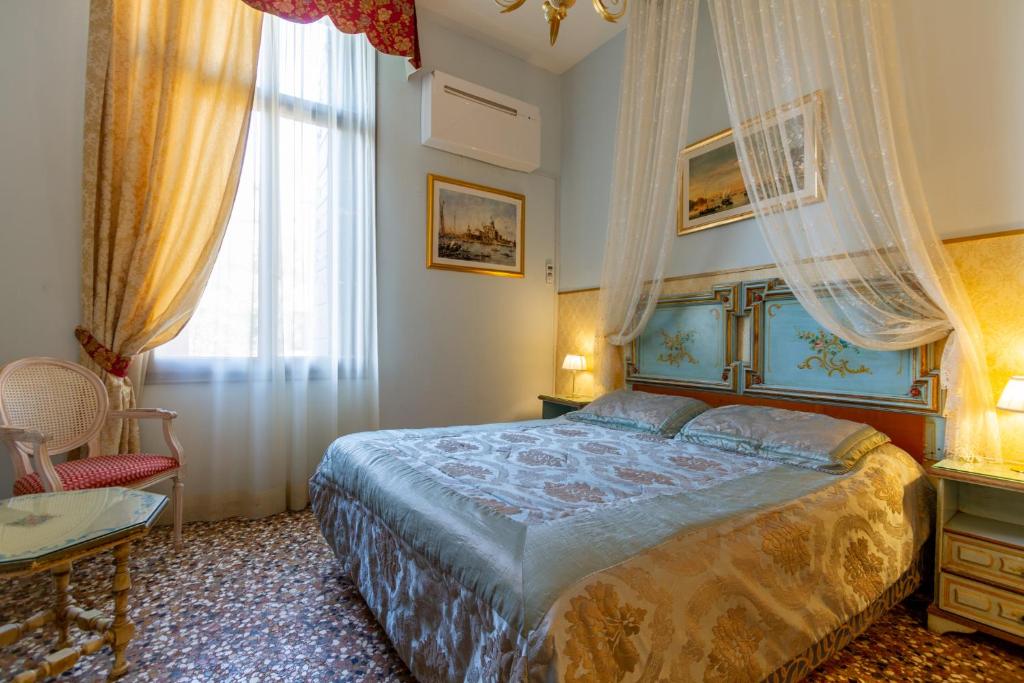 Postel nebo postele na pokoji v ubytování Art Dreams B&B