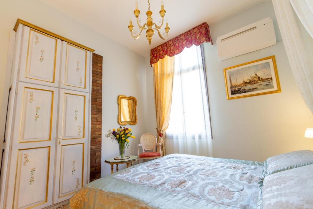 Postel nebo postele na pokoji v ubytování Art Dreams B&B