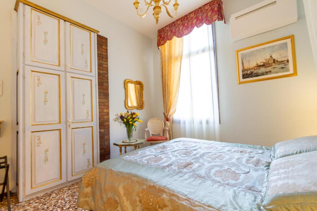 Postel nebo postele na pokoji v ubytování Art Dreams B&B