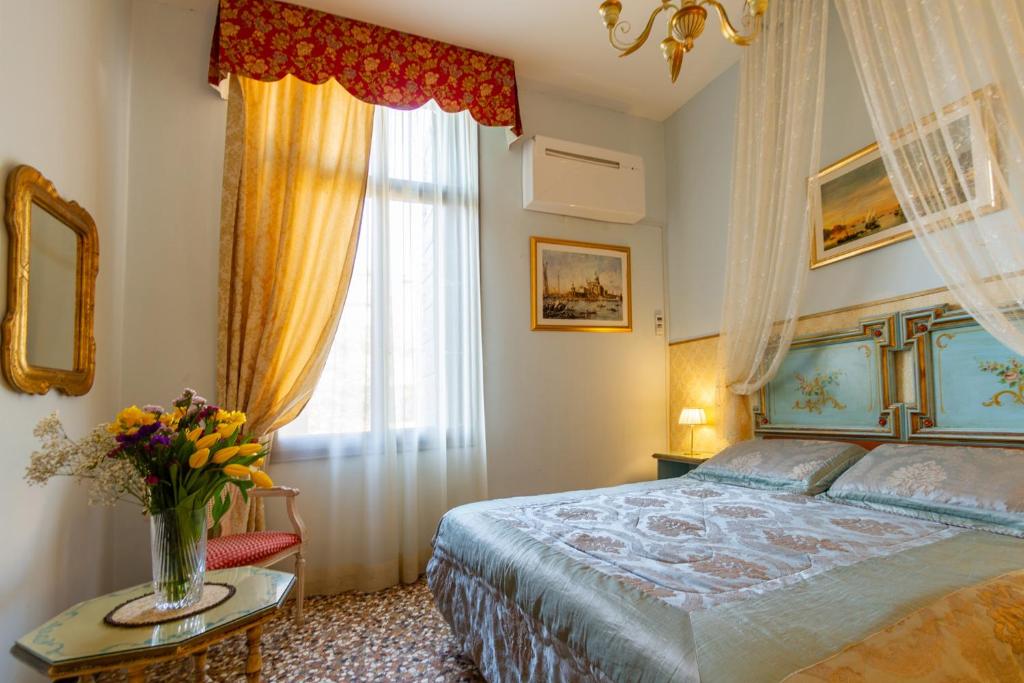Postel nebo postele na pokoji v ubytování Art Dreams B&B