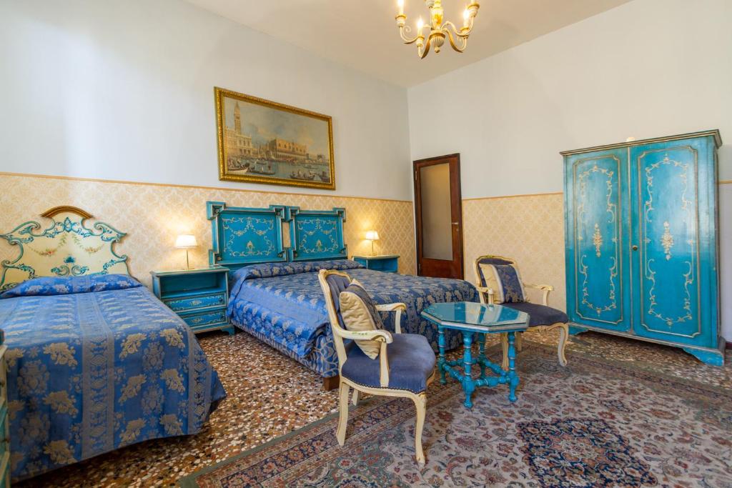 Postel nebo postele na pokoji v ubytování Art Dreams B&B