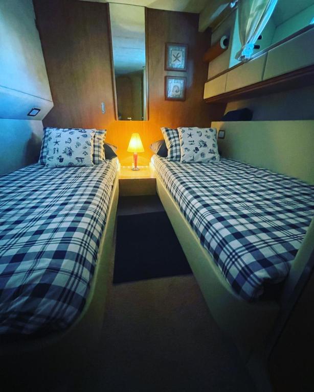 Postel nebo postele na pokoji v ubytování Boat Sirio