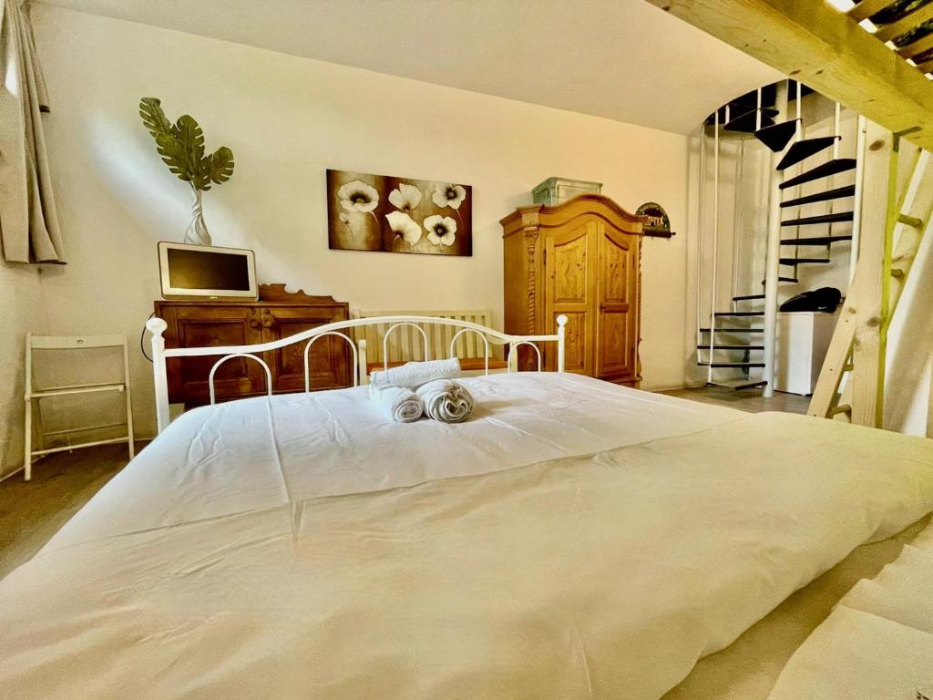 Posteľ alebo postele v izbe v ubytovaní Casa Michele - Alle Ninfee - by tourquoisevea