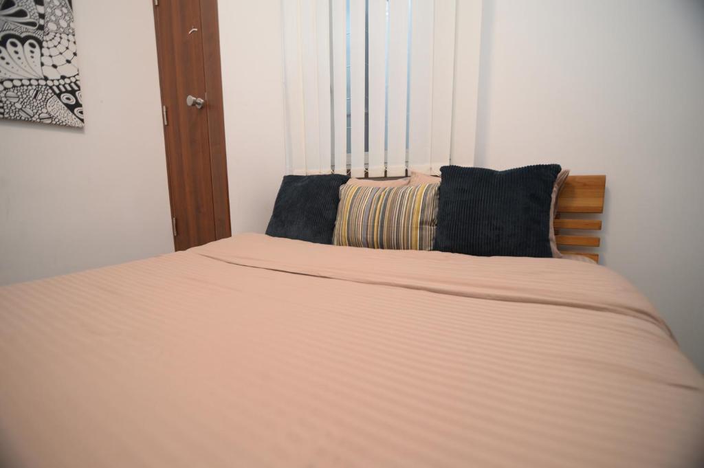 Postel nebo postele na pokoji v ubytování Apartmani Čarolija