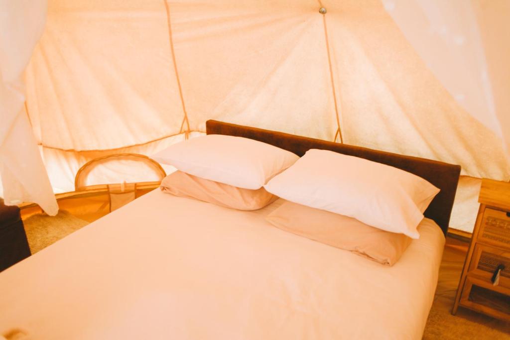 Postel nebo postele na pokoji v ubytování Kabaceira Glamping