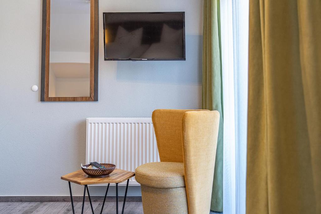 TV a/nebo společenská místnost v ubytování Hotel Jakob