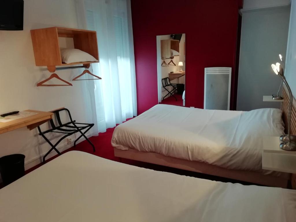 Postel nebo postele na pokoji v ubytování Hôtel Chez Pierre d'Agos