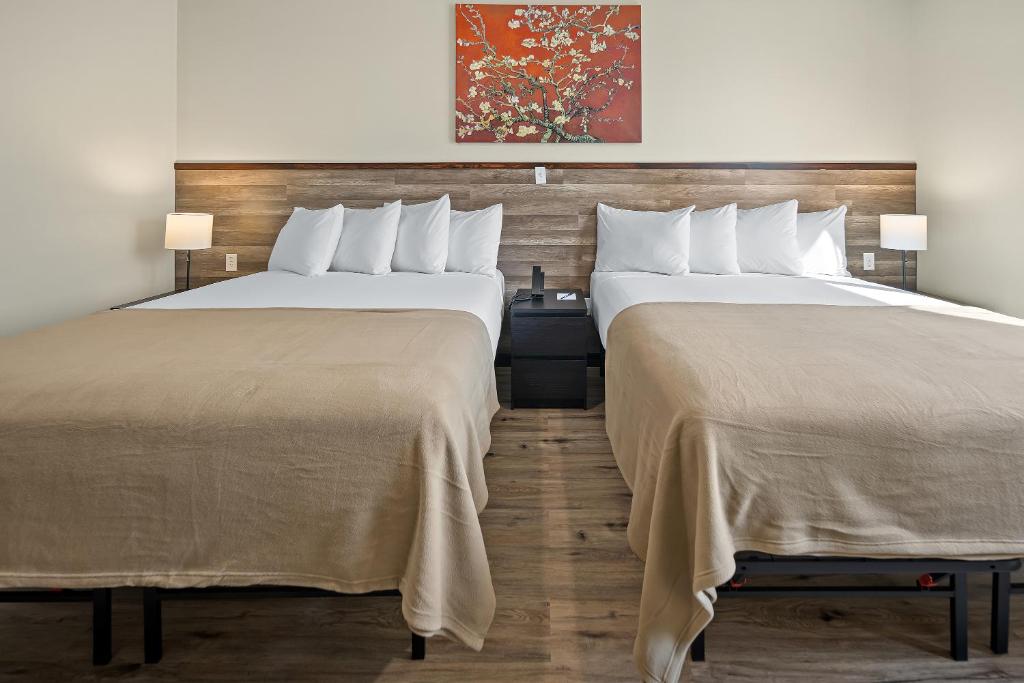 Postel nebo postele na pokoji v ubytování Highbridge Hotel