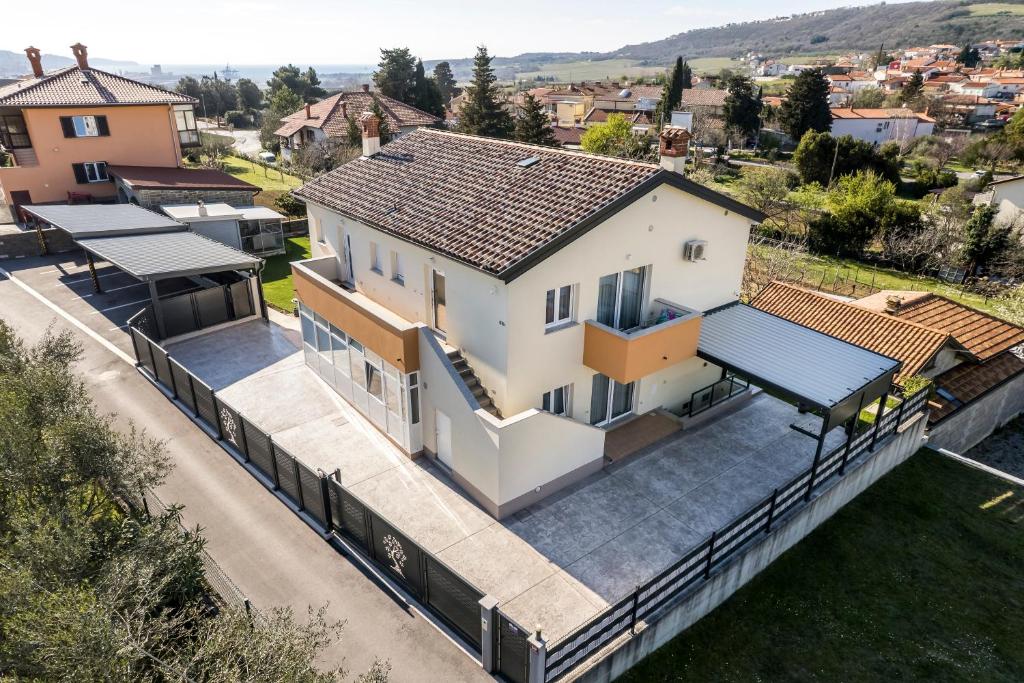 an aerial view of a house with a driveway at Apartments Mirela in Koper