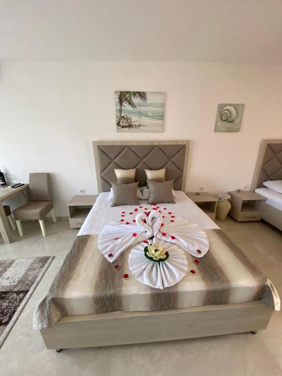 Postel nebo postele na pokoji v ubytování Apartments Gusar