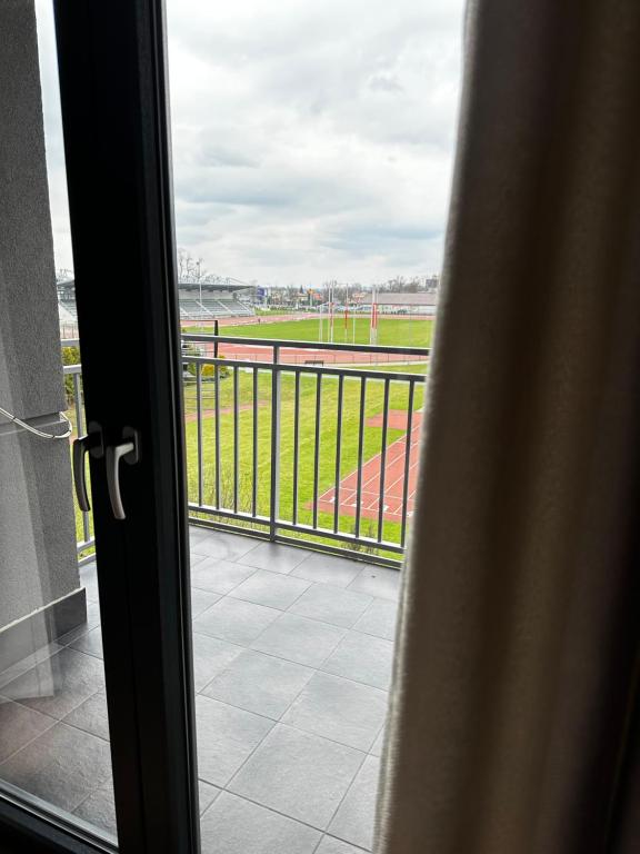 Balkón alebo terasa v ubytovaní OLIMPIC Apartament Klimatyzacja Garaż Winda Suwałki
