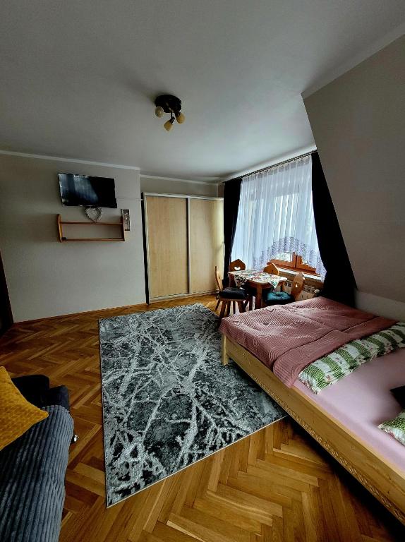 Posteľ alebo postele v izbe v ubytovaní Noclegi Bobrowski
