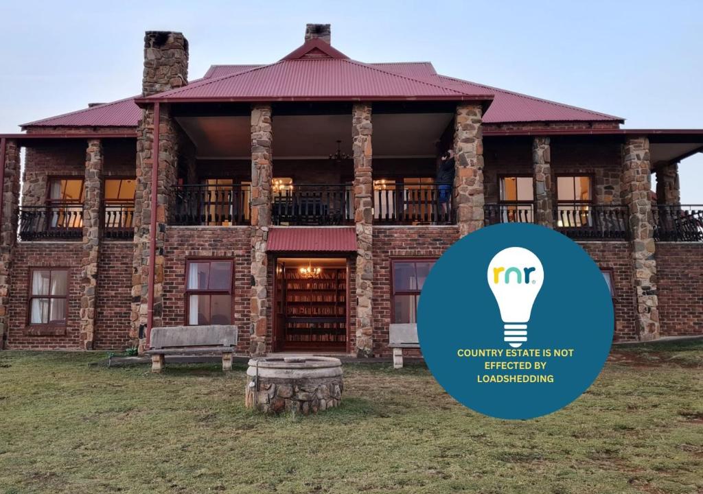 a building with a light bulb in front of it at Stone Castle, Dullstroom Country Estate in Dullstroom