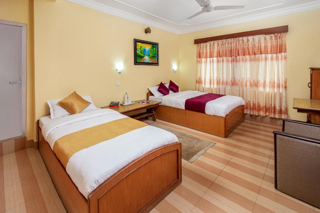 Voodi või voodid majutusasutuse Hotel Yeti toas