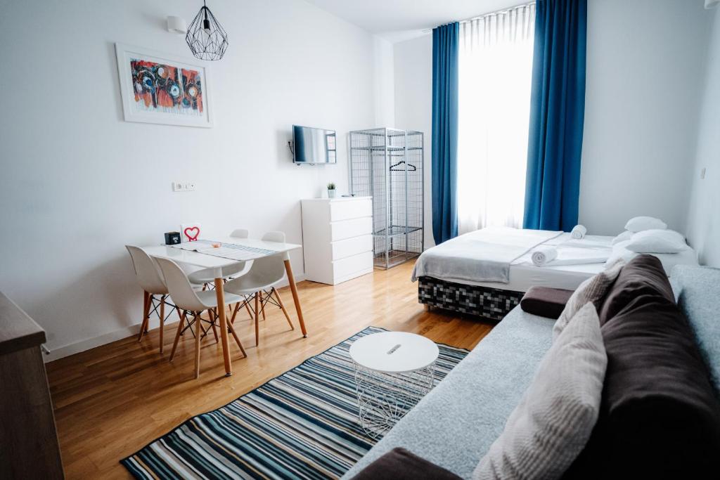 Posteľ alebo postele v izbe v ubytovaní DTA Hebrangova