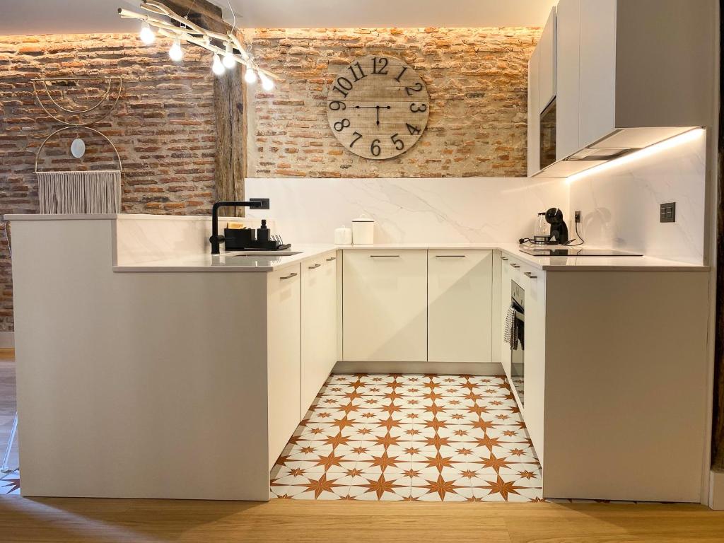 Kuchyň nebo kuchyňský kout v ubytování Ribera AC by Staynnapartments