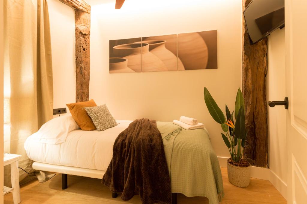 Postel nebo postele na pokoji v ubytování Ribera AC by Staynnapartments