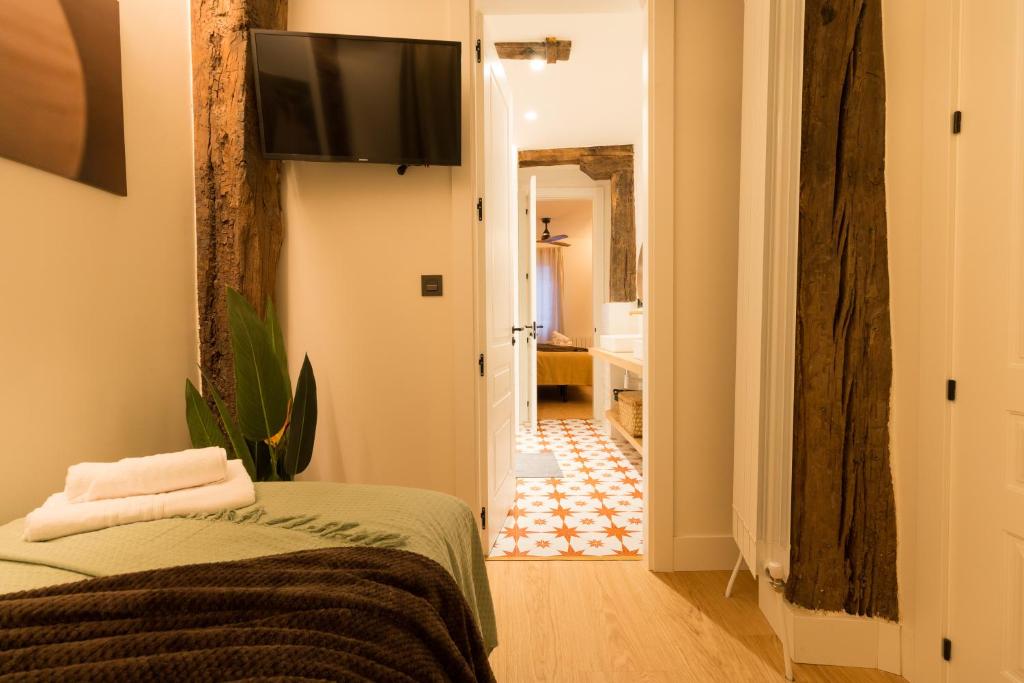 Postel nebo postele na pokoji v ubytování Ribera AC by Staynnapartments