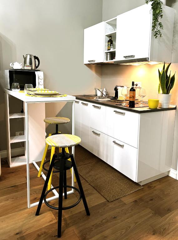 A kitchen or kitchenette at Room114 - Studio apartment near the center