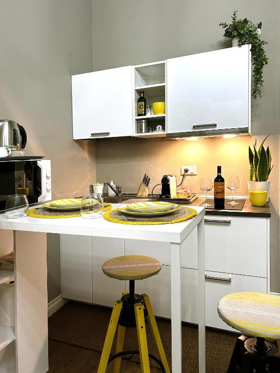 A kitchen or kitchenette at Room114 - Studio apartment near the center