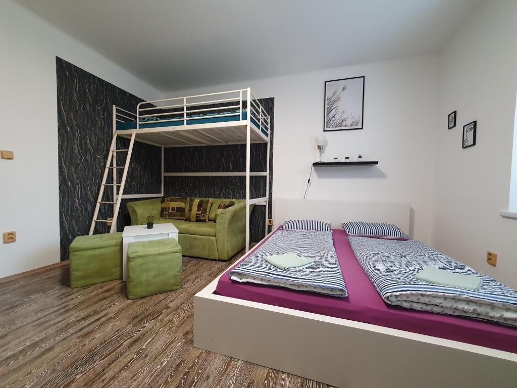 Postel nebo postele na pokoji v ubytování Apartmán U Jakuba