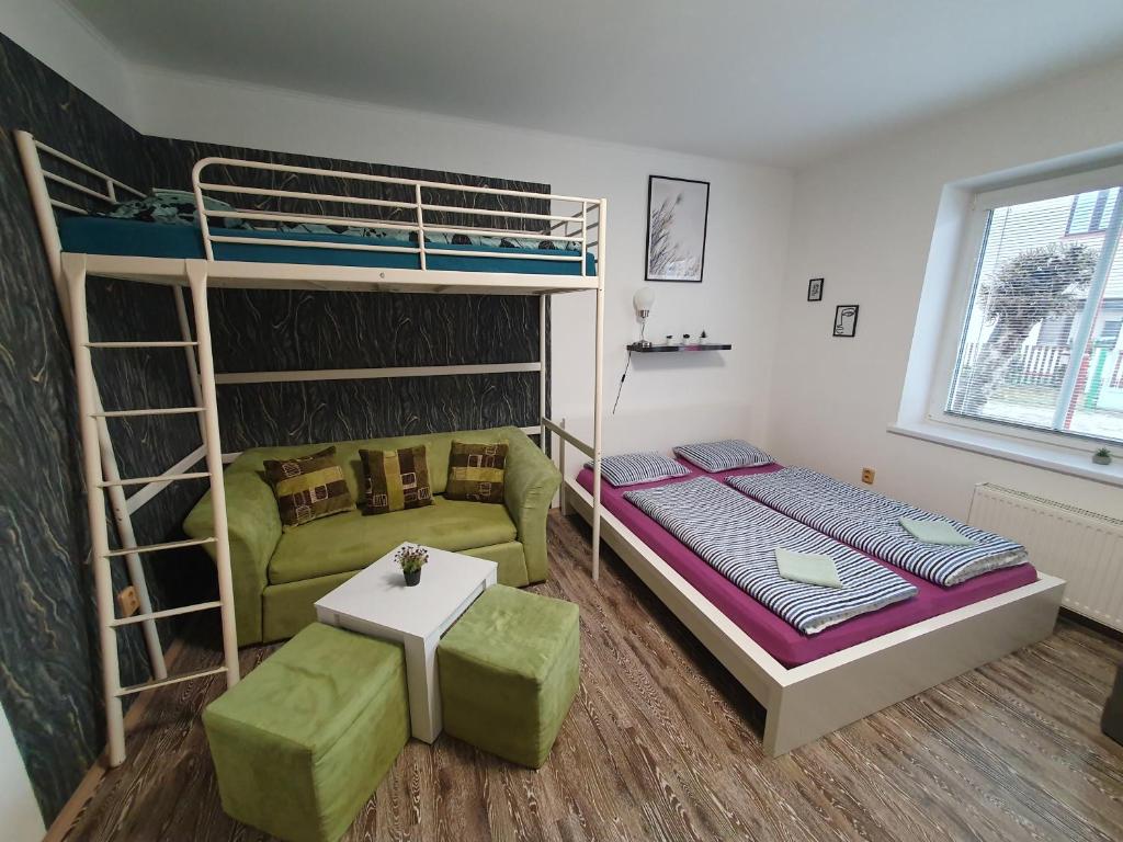 Postel nebo postele na pokoji v ubytování Apartmán U Jakuba
