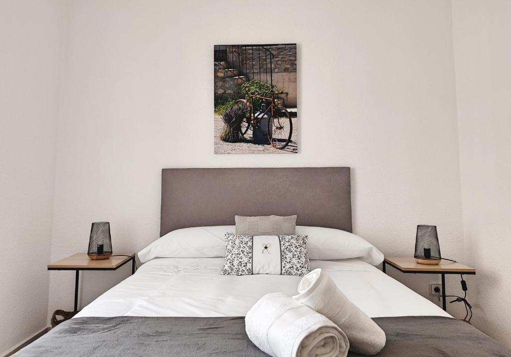 Posteľ alebo postele v izbe v ubytovaní Céntrico Apartamento Jardines de Vallellano