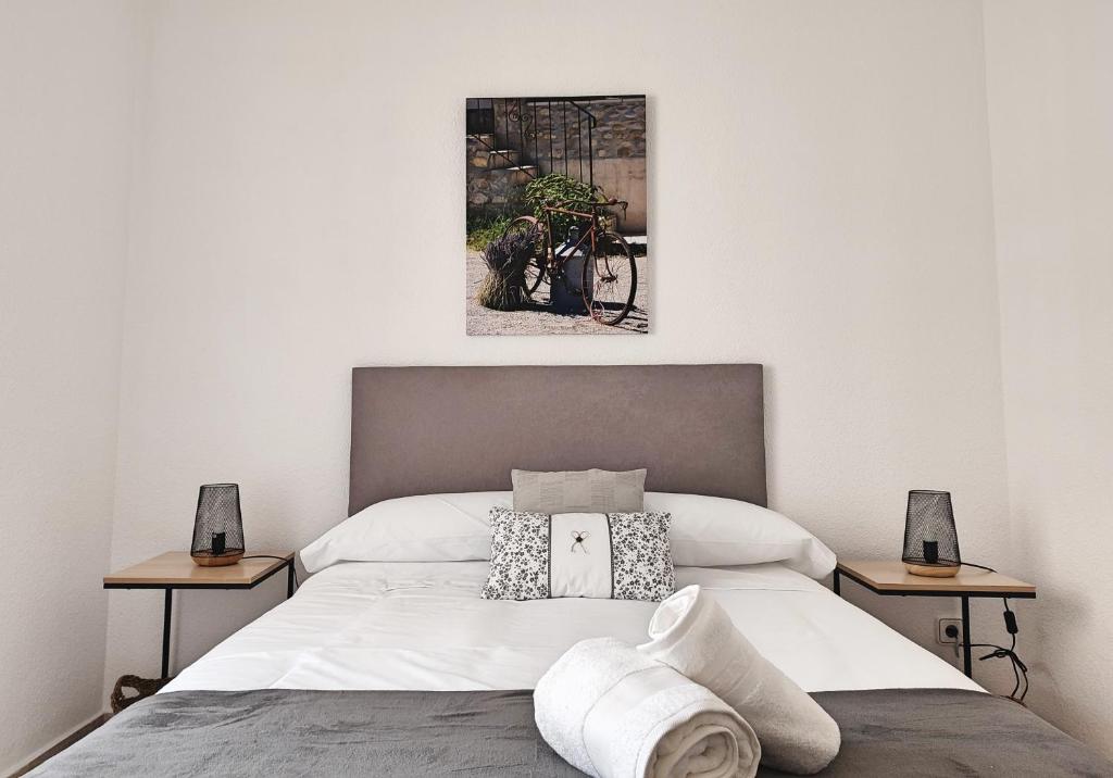 Postel nebo postele na pokoji v ubytování Céntrico Apartamento Jardines de Vallellano