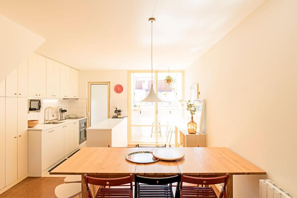 Kuchyň nebo kuchyňský kout v ubytování Casa 128 by LovelyStay