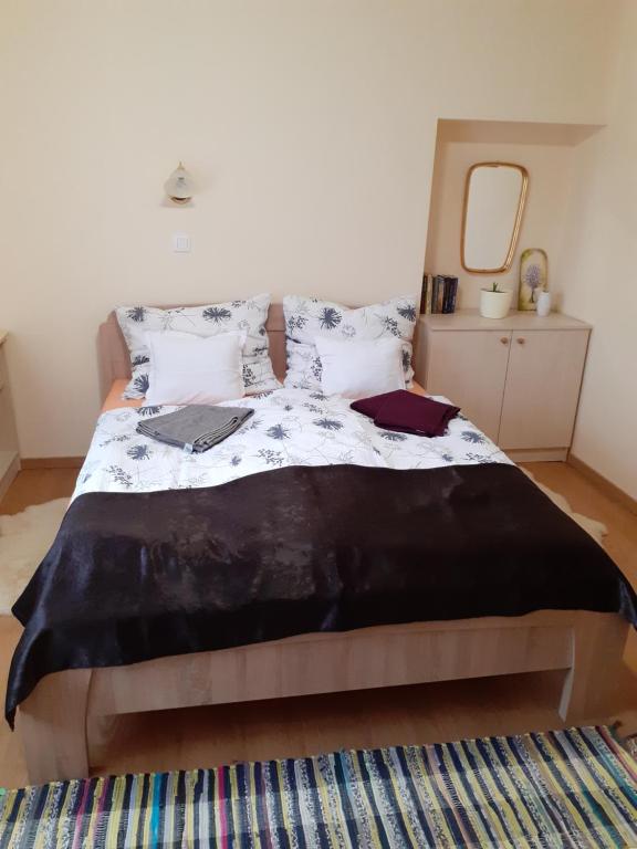Postel nebo postele na pokoji v ubytování St. Rita Guesthouse