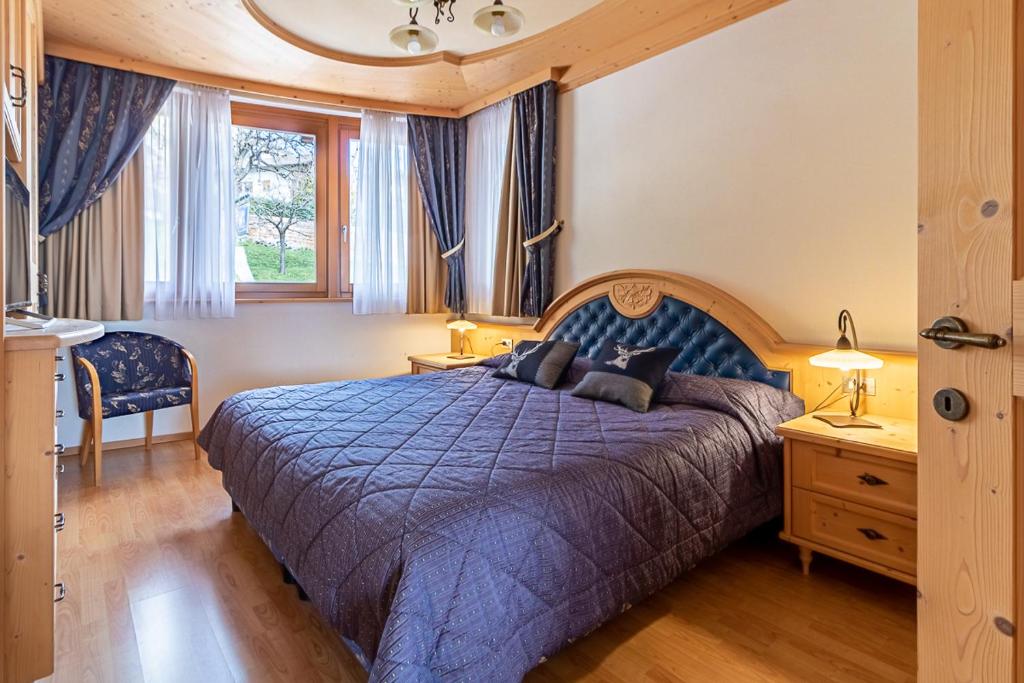 Postel nebo postele na pokoji v ubytování Hotel Arcobaleno