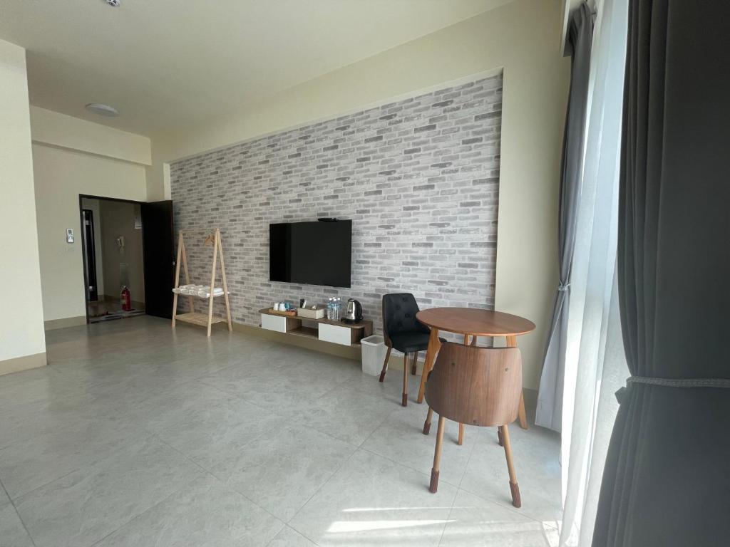 TV a/nebo společenská místnost v ubytování Suixiang B&B