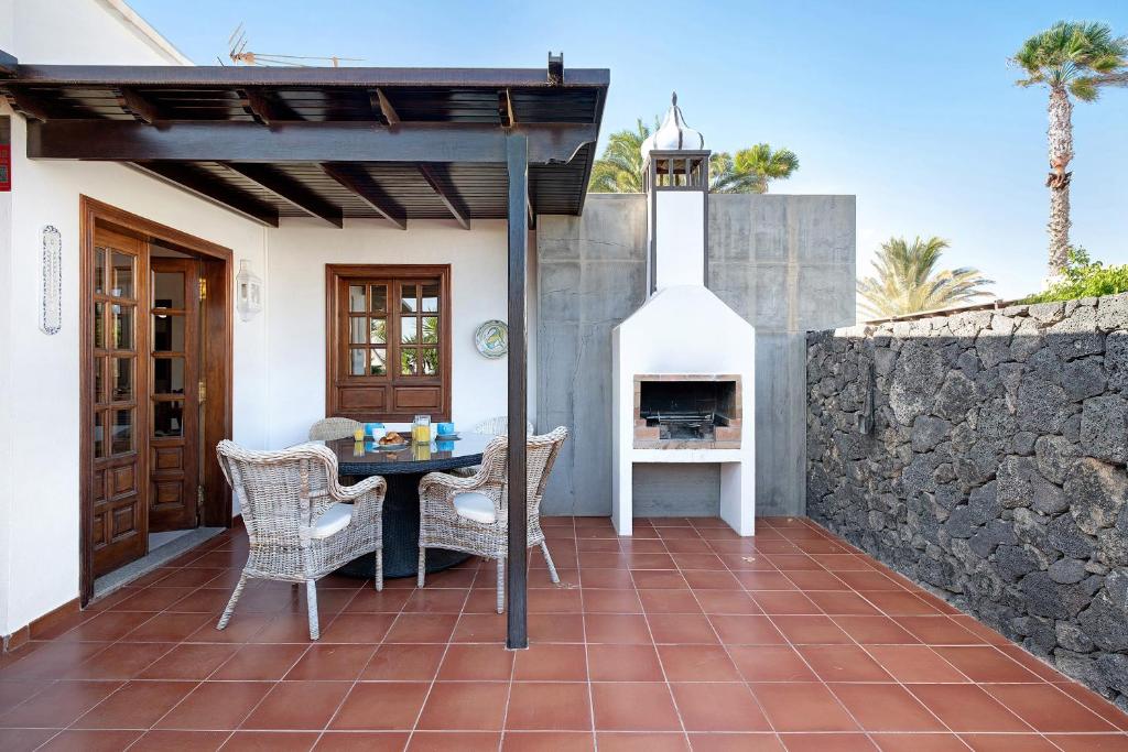Patio nebo venkovní prostory v ubytování Villa Las Palmeras