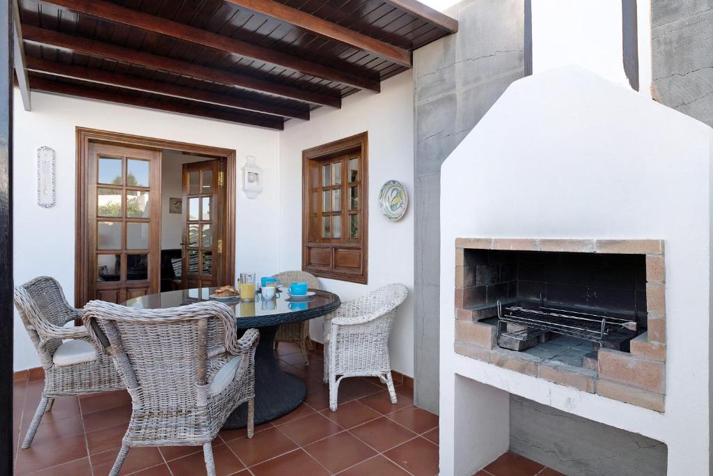 Patio nebo venkovní prostory v ubytování Villa Las Palmeras