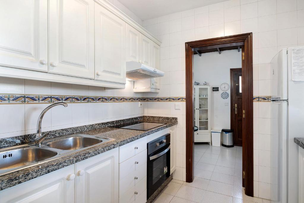 Kuchyň nebo kuchyňský kout v ubytování Villa Las Palmeras