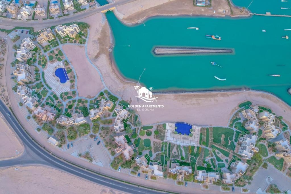 a map of a resort near the water at Golden Apartments El Gouna in Hurghada