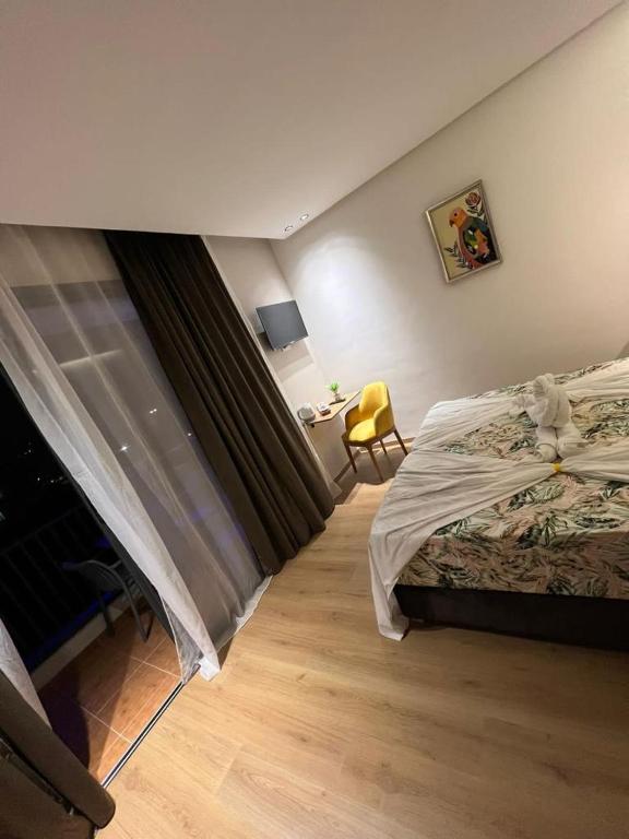 Postel nebo postele na pokoji v ubytování Hotel beaux arts